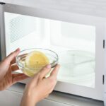 Remove a smelly microwave by using natural deodorizing methods like vinegar steam or baking soda to eliminate stubborn odors and keep it fresh