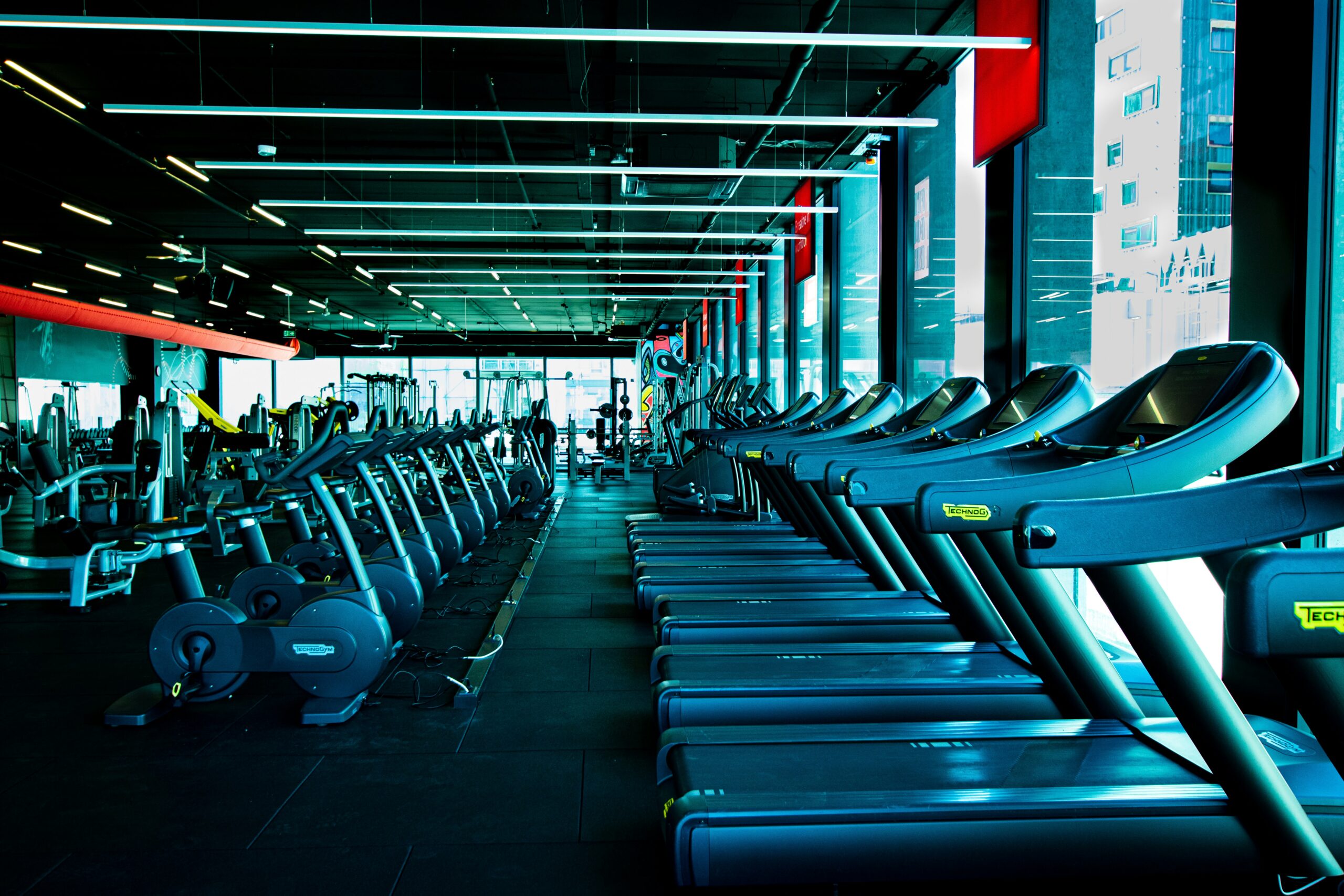 gym cleaning services: 9 pro must-do tasks for safer facilities 10 Gym cleaning services in a cardio area with equipment wipes